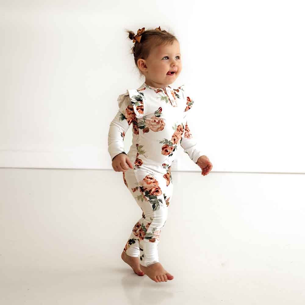 Toddler wearing Rosebud Growsuit by Snuggle Hunny