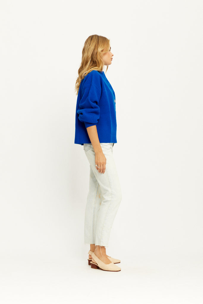 Model showing the side of the Alanis Knit Jumper in Cobalt by Arnhem Clothing