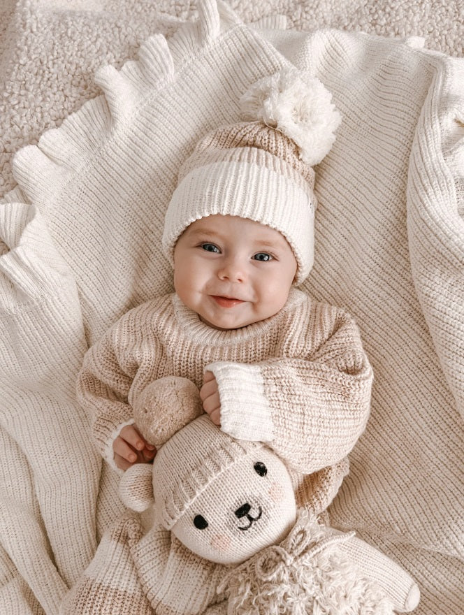 Baby wearing the Beanie Two Tone Petal by Ziggy Lou