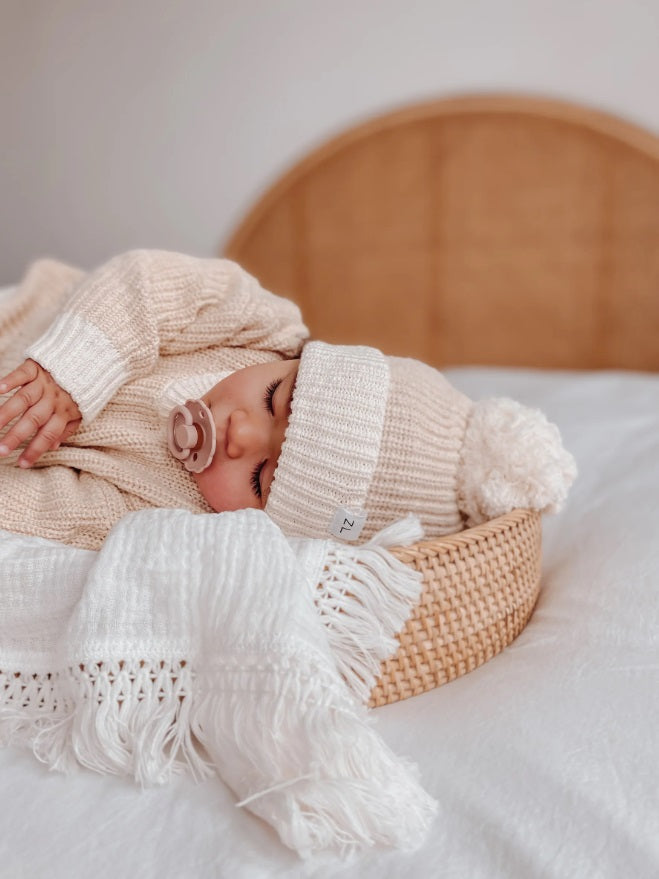 Baby asleep wearing the Beanie Two Tone Petal by Ziggy Lou