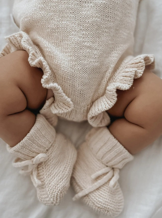 Baby wearing the Booties Petal by Ziggy Lou