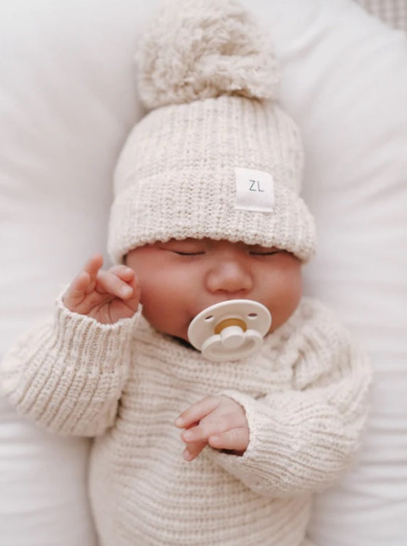 Baby asleep wearing Beanie Honey by Ziggy Lou