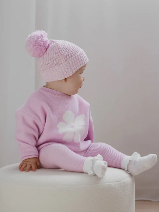 Baby sitting wearing the Beanie Lavender by Ziggy Lou