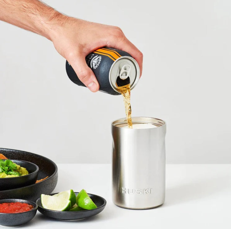 Showing you can pour drinks straight into the Insulated Beer Cooler by Huski
