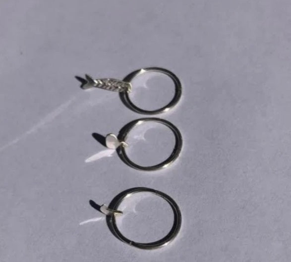 Small vs Large of the Mermaid Tails and Heart Charm Sleepers by Tarn Contemporary Jewellery