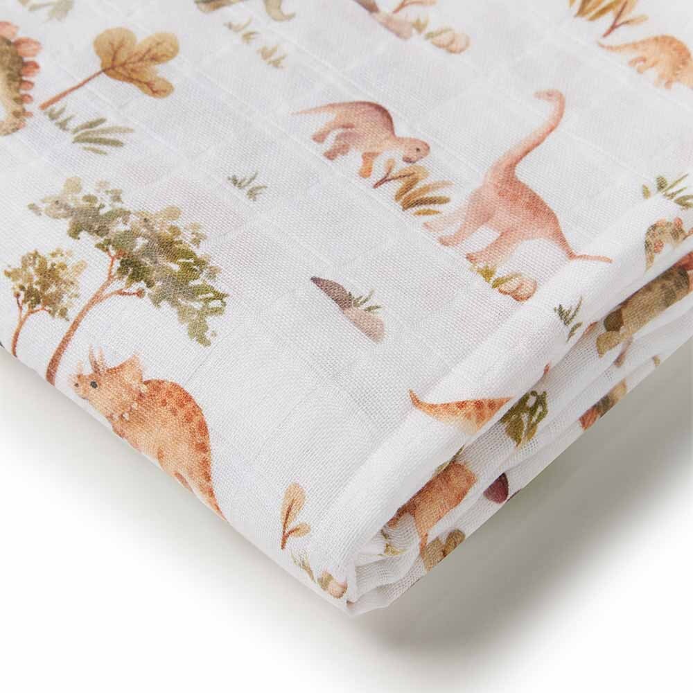 Close up of the Dino Organic Muslin Wrap by Snuggle Hunny