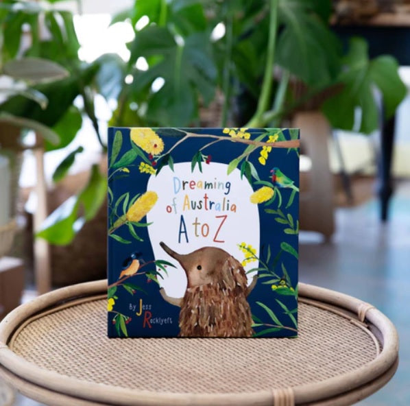 Dreaming of Australia A to Z by Windy Hollow Books sitting on table