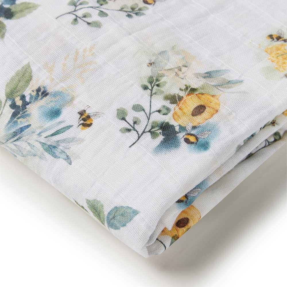 Close of of the Garden Bee Organic Muslin Wrap by Snuggle Hunny