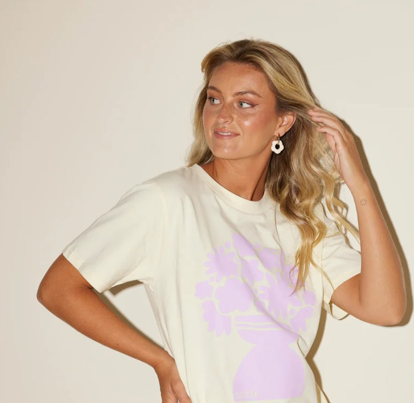 Model wearing the Gloria Hoops Cream by Emeldo