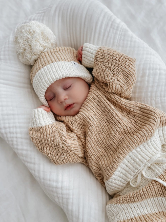 Baby wearing the Jumper Two Tone Wheat by Ziggy Lou