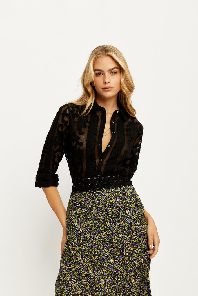 Model wearing the Joni Midi Skirt in Moonless by Arnhem Clothing