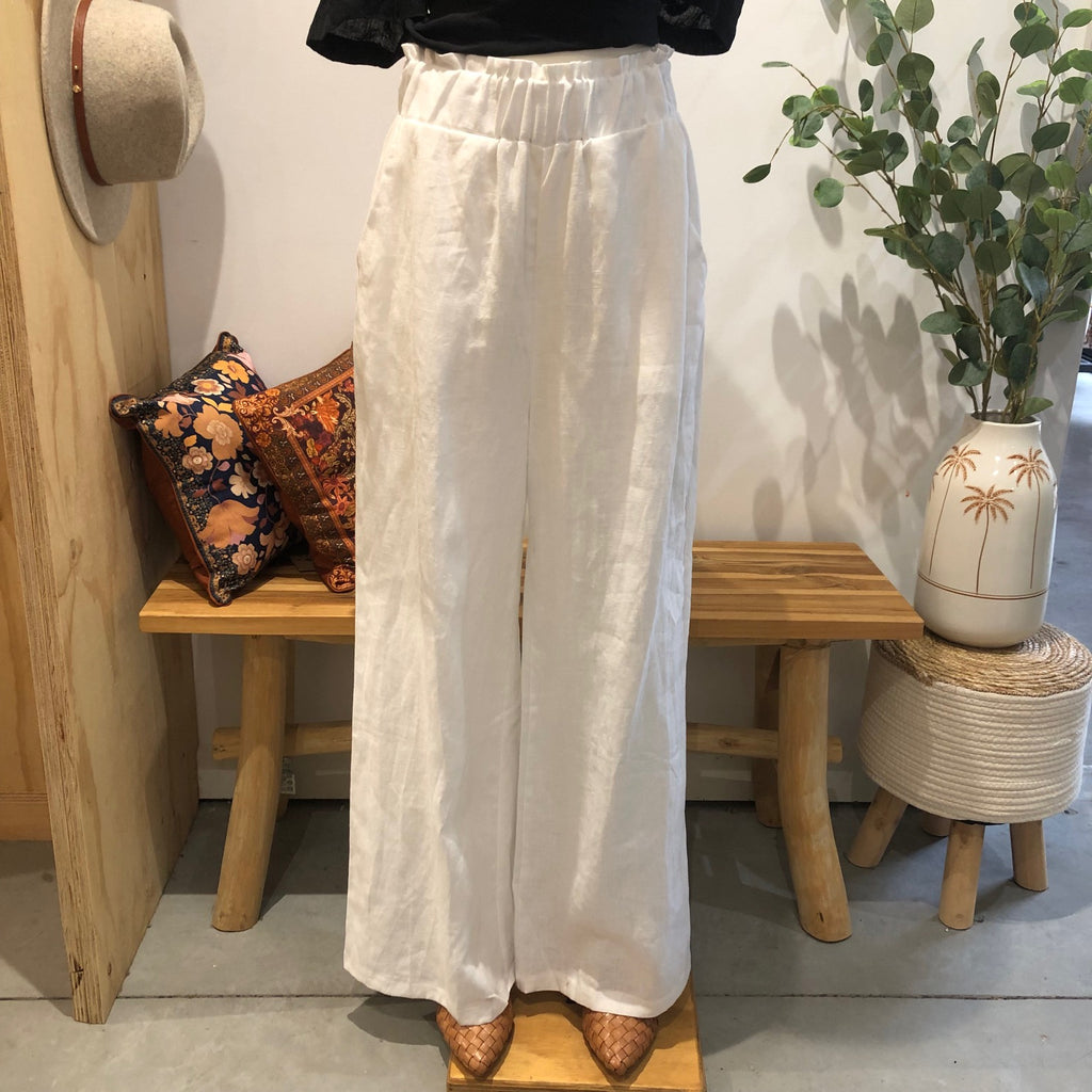 Mannequin wearing the White Freya Linen Pants by Little Lies