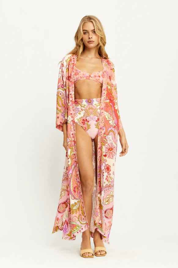 Person wearing the Malibu Kimono in Coral by Arnhem Clothing