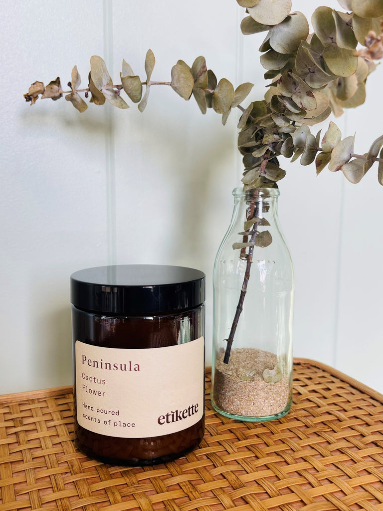 Styled photo of the Etikette Soy Candle- PENINSULA in Cactus Flower in small