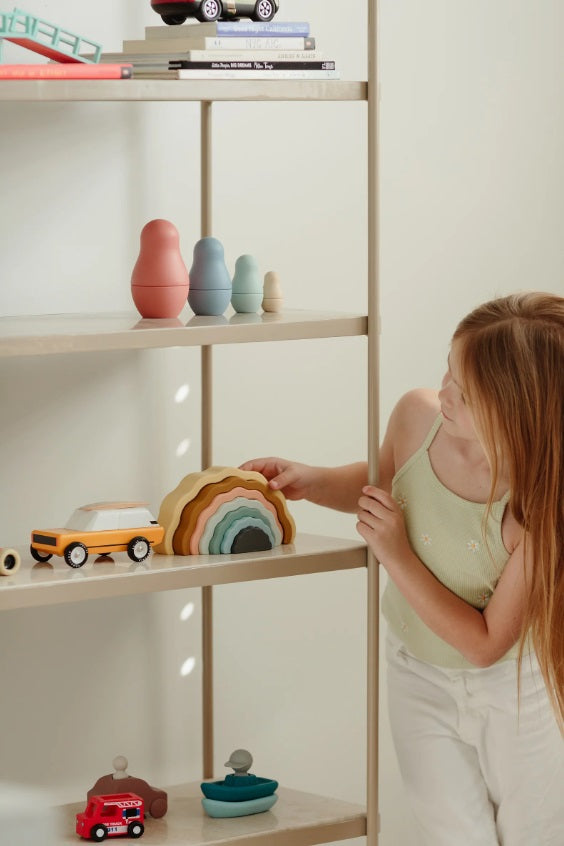 Child playing with the Rainbow Bundle Set by Little Drop