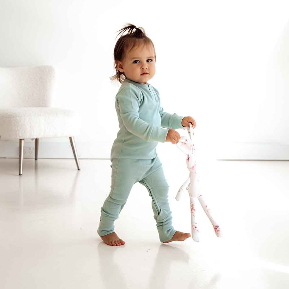 Toddler walking in the Sage Growsuit by Snuggle Hunny 