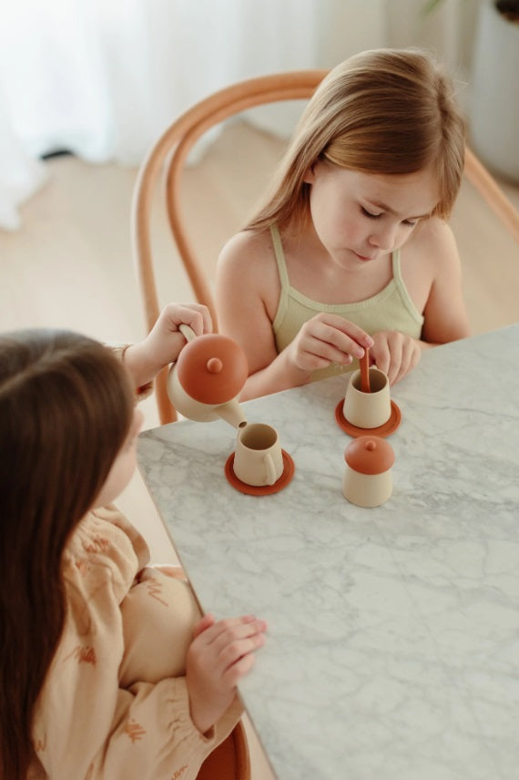 Children playing with the Orche Tea Time Set by Little Drop