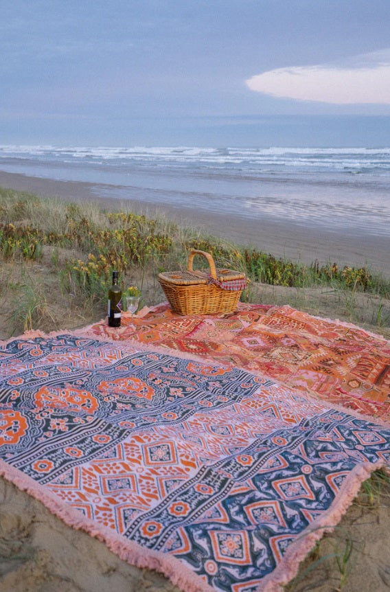 The Poppy Rug by Salty Aura bring used at the beach