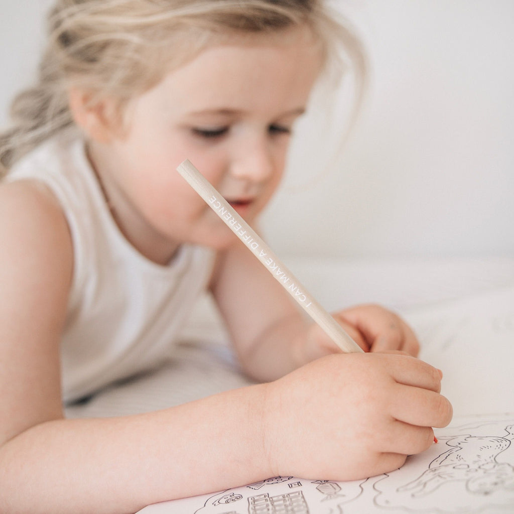 Child using the Affirmation Colouring Pencils - Mindful & Co