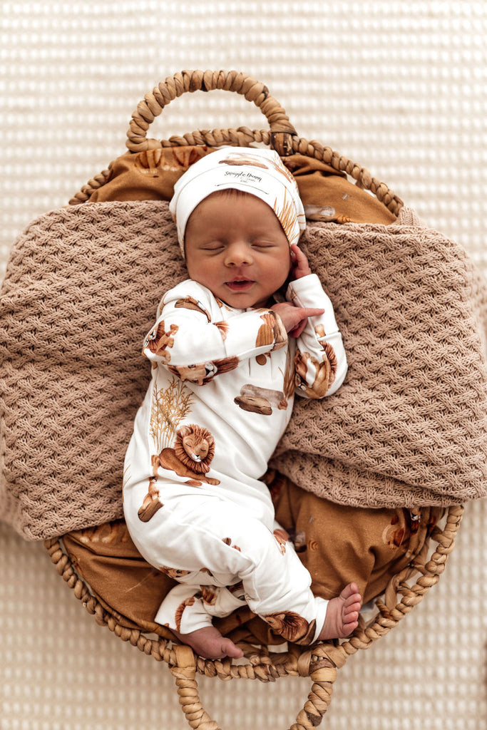 Baby Sleeping wearing the Lion Organic Knotted Beanie by Snuggle Hunny